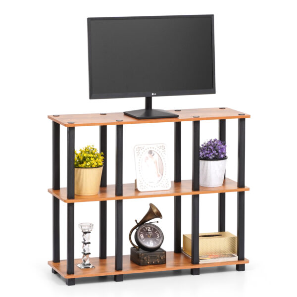 3 tier TV stand in brown wood with open storage shelves holding television and living room decor